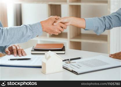 client customer handshake together for successful deal to buy insurance services make sale purchase deal agreement