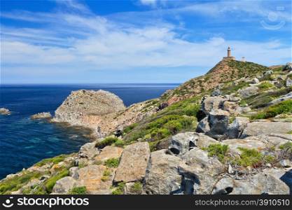 cliff and lighthouse in Capo Sandalo island, Carloforte, south west sardinia, Italy