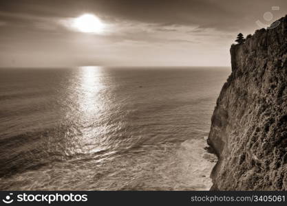 cliff of Uluwatu Temple during sunset, Bali, Indonesia