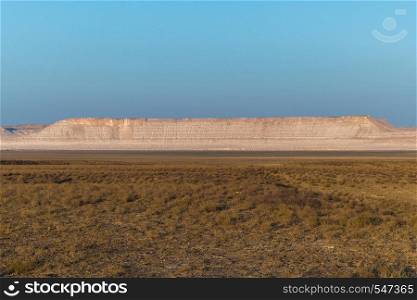 Cliff on the edge of the Ustiurt plateau, Kazakhstan.. Cliff on the edge of the Ustiurt plateau, Kazakhstan