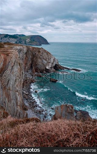 cliff, rocks and sea on the coast in Bilbao Spain, travel destination