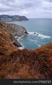 cliff, rocks and sea on the coast in Bilbao Spain, travel destination