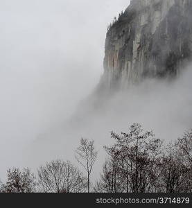 Cliff surrounded with fog, Shannon Falls Provincial Park, British Columbia, Canada