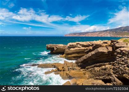 Cliffs and rocks on the Atlantic ocean coast in Sintra in a beautiful summer day, Portugal