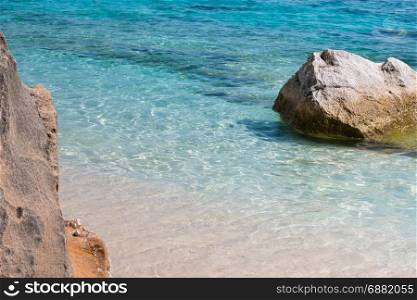 Cliffs in Sardinia Island near Turquoise Sea, Summer in Italy
