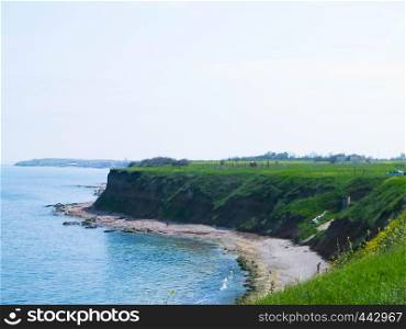 Cliffs on the Black Sea coas. Landscape of cliffs and beach in Vama Veche, Dobrogea region, Romania. Nature and traveling concept.. Cliffs on the Black Sea coast, Dobrogea region, Romania.