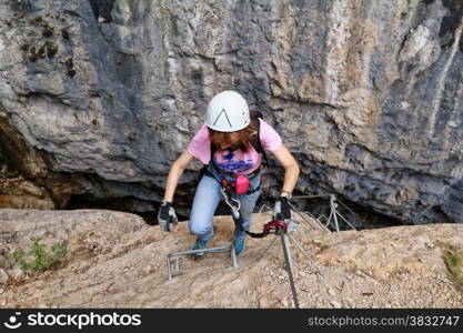 climber on Burrone Giovannelli via ferrata, Mezzacorona, Trentino, Italy