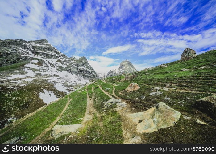 climbers walk up on glacier in the mountain