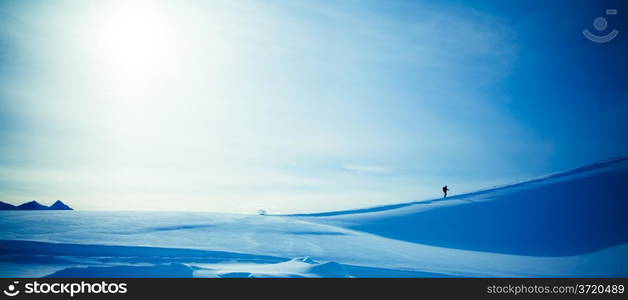 climbing a mountain. alpinists climbing a mountain