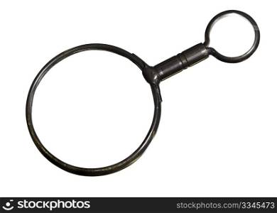 Clipping path around antique brass magnifying glass isolated against white