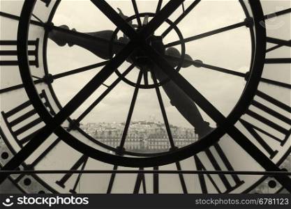 Clock and view of Montmartre, Paris, Ile de France, France