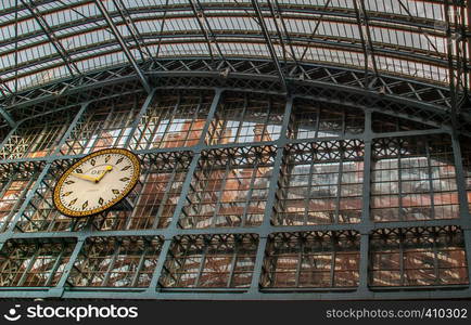 Clock at King's Cross railway station in london.