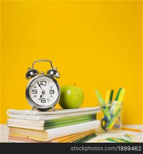 clock books with defocused background. Resolution and high quality beautiful photo. clock books with defocused background. High quality beautiful photo concept