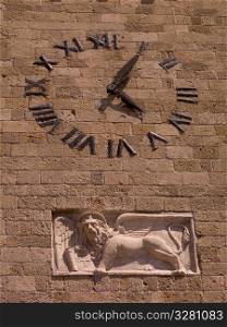 Clock on wall in Rhodes Greece