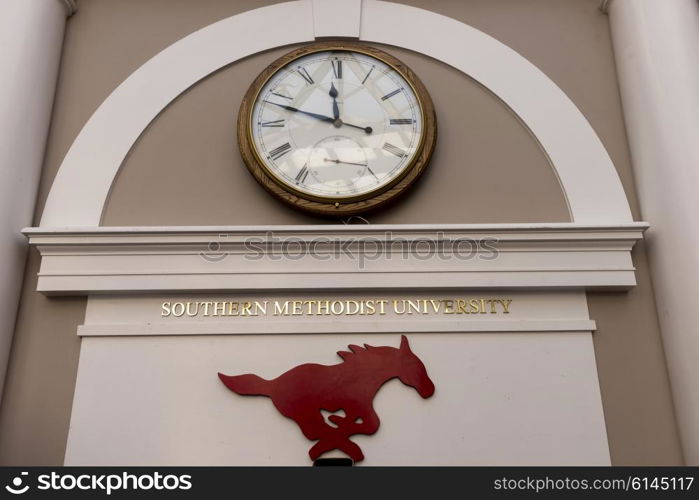 Clock on wall, Southern Methodist University, Dallas, Texas, USA