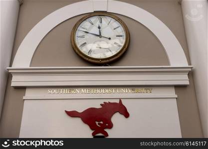 Clock on wall, Southern Methodist University, Dallas, Texas, USA