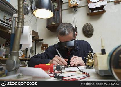 Clock Repairman at Work