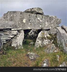 Cloghanmore is a megalithic chamber tomb of the court tomb (or court cairn) type located about 8 km east from Carrick in Malin More, Glencolmcille, in County Donegal, Ireland.