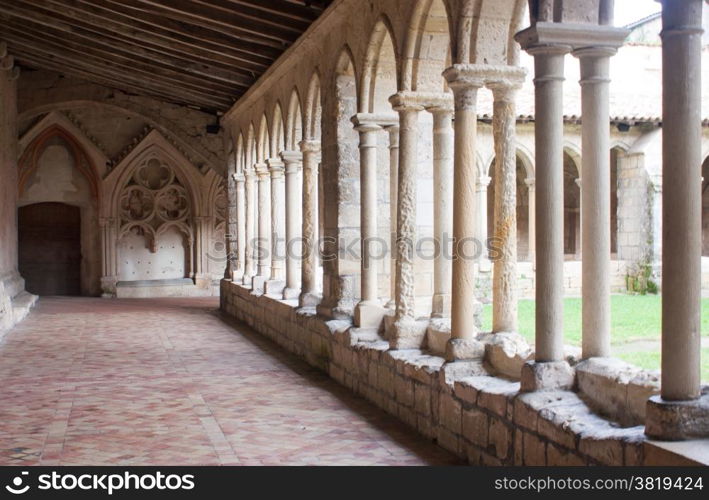 Cloister of St. Emilion. Arches in a cloister of St. Emilion in France