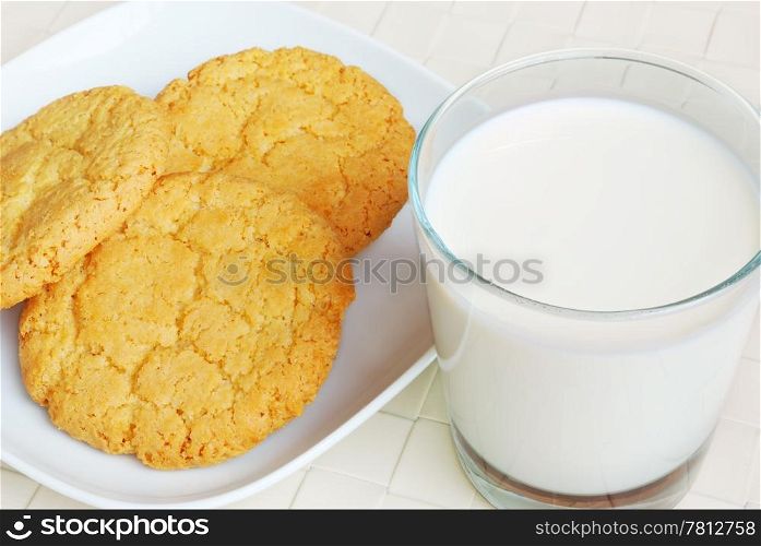 Close-of cookies and glass with milk. Milk and cookies