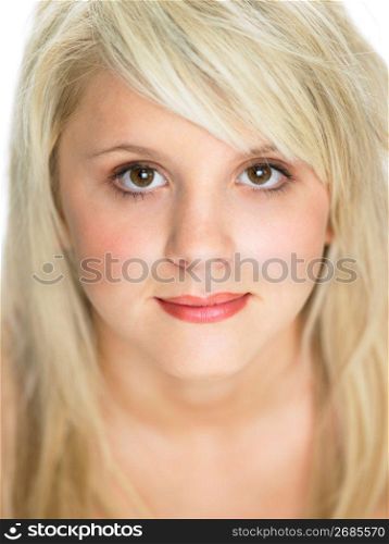 Close Studio Portrait Of Blonde Teenage Girl