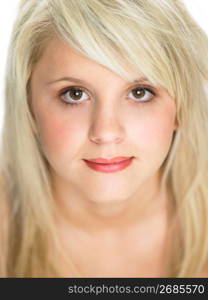 Close Studio Portrait Of Blonde Teenage Girl