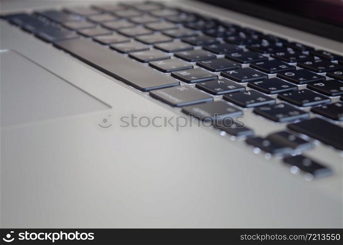 Close up at laptop keyboard, stock photo