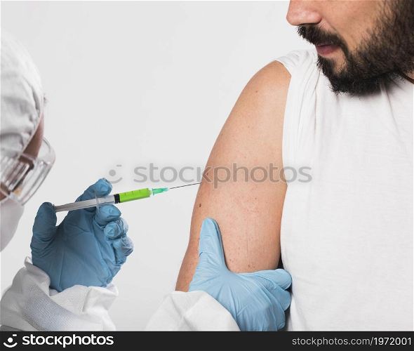 close up bearded man being vaccinated. High resolution photo. close up bearded man being vaccinated. High quality photo