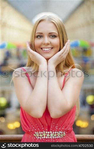 Close up, Beautiful young blonde woman in shop