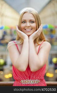Close up, Beautiful young blonde woman in shop