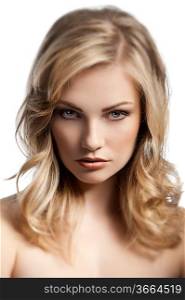 close up beauty portrait of a young and cute blond lady with hair style over white