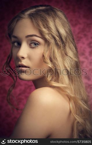 close-up beauty portrait of pretty young woman with perfect skin and cute blonde silky wavy hair