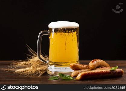 close up beer mug with sausages