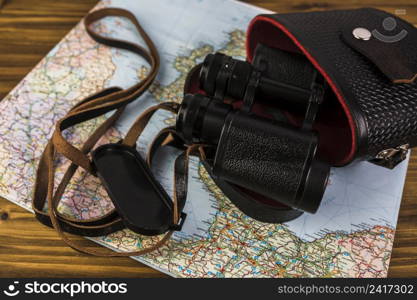 close up binocular with case map