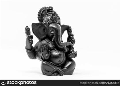 Close up black statue of Lord Ganesha isolated background. Close up black statue of Lord Ganesha isolated