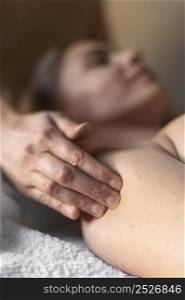 close up blurry woman massage