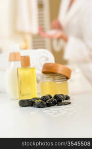 Close-up body care products spa treatment in bathroom