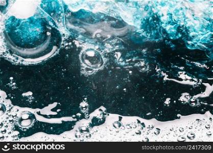 close up bubbles slashes bright water