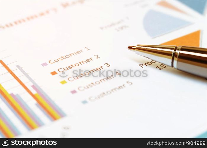 Close up business concept, Pen is on summary report on paperwork on table office.
