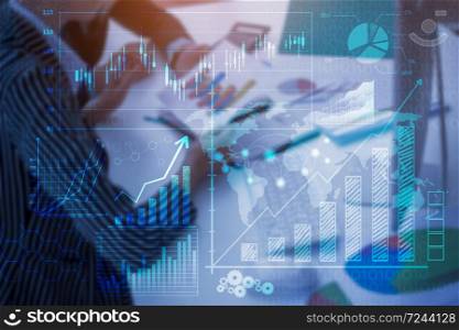 Close up business people are analysis business report with digital virtual screen , Business financial background
