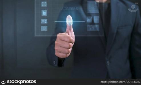 Close up businessman is touching interface computer monitor, fingerprint biometric identity and approval.  future security and password control through fingerprints technology and cybernetic, business