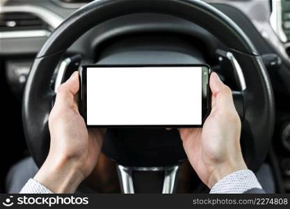 close up businessman s hand holding smartphone front steering wheel