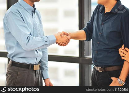 Close up businessman Shake hands,People hands shake agree business