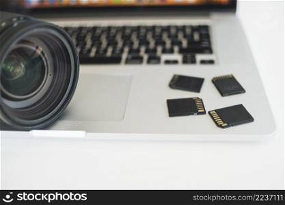 close up camera lens memory cards laptop