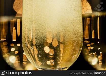 close up champagne bubbles glasses