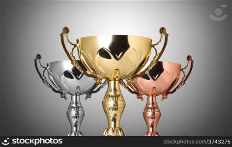 close up champion silver trophy on gray background