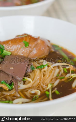 close up Chicken noodle soup , Thai style food