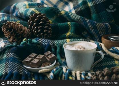 close up coffee cup with blanket