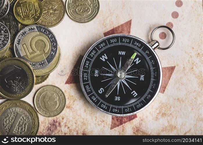 close up coins compass