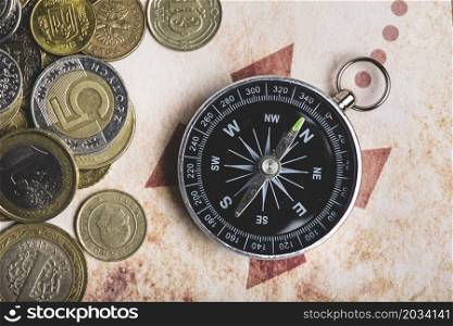 close up coins compass